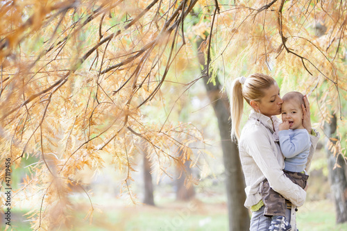 Mother and boy in the autum...