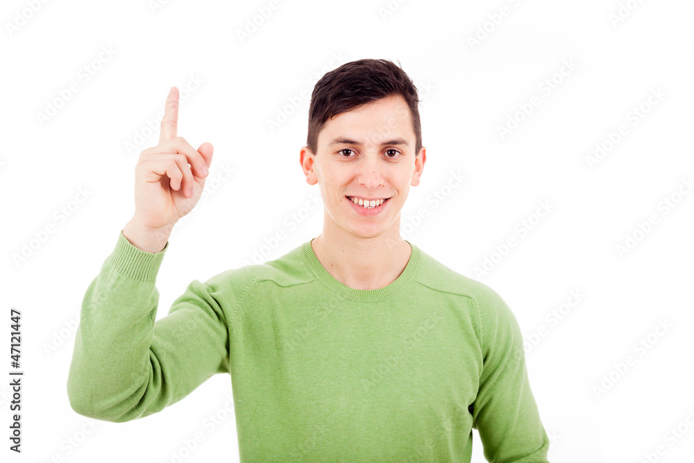 Portrait of happy young casual man pointing over white backgroun Portrait of happy young casual man pointing over white backgroun