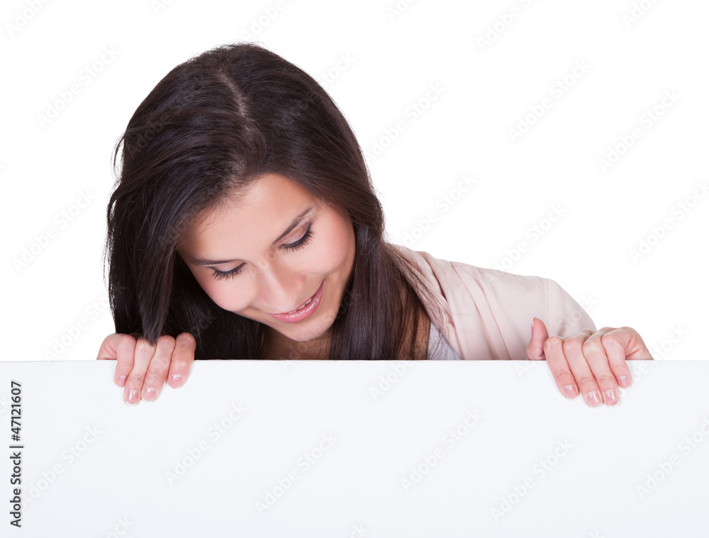 Smiling beautiful woman holding blank banner Smiling beautiful woman holding blank banner