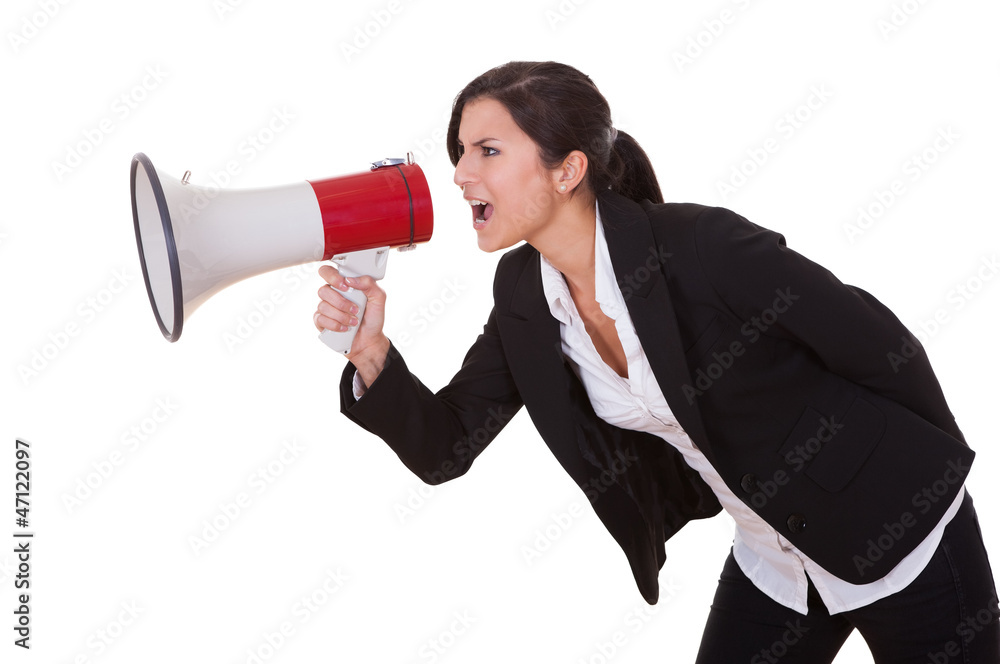 Woman shouts through a megaphone