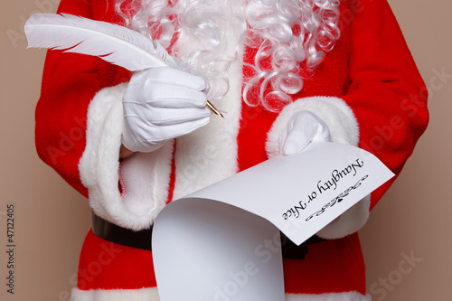 Santa Claus checking his list