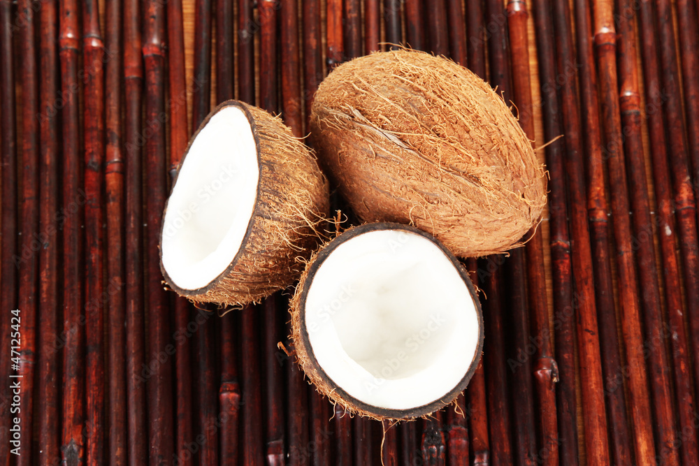 coconuts on a bamboo mat close-up coconuts on a bamboo mat close-up