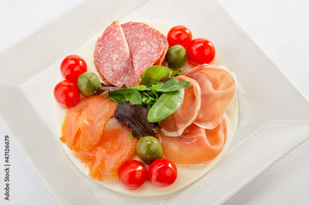 Mixed appetizer on mozzarella bed Mixed appetizer on mozzarella bed