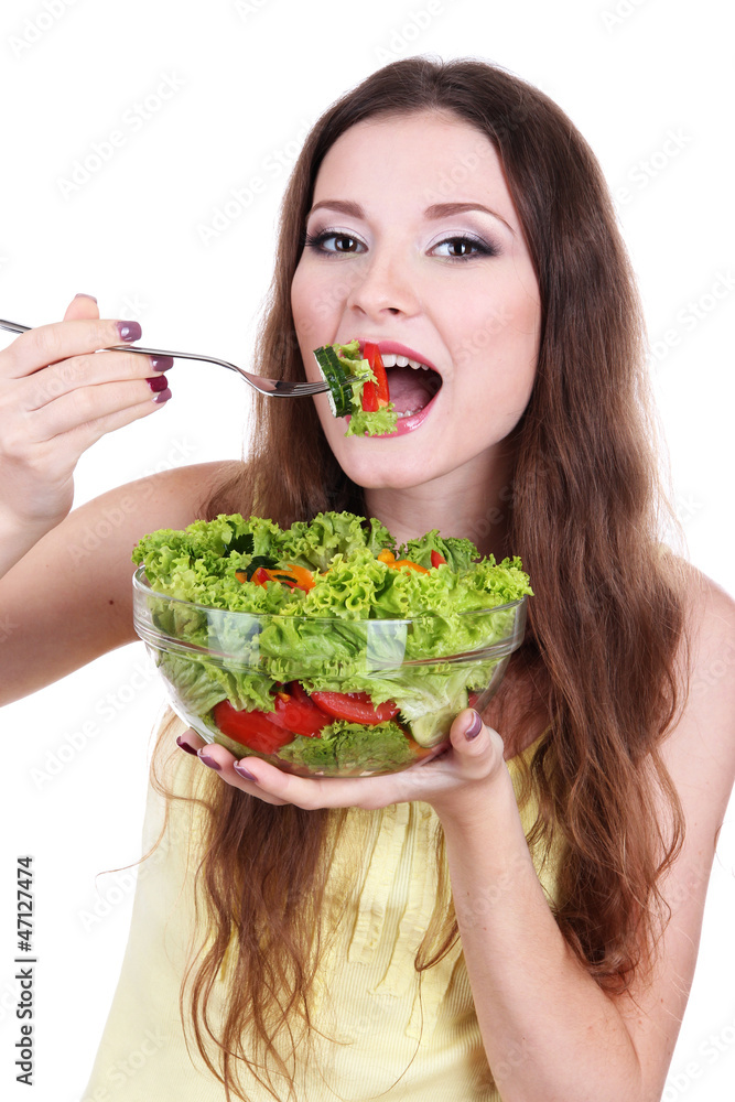Beautiful woman with vegetable salad isolated on white Beautiful woman with vegetable salad isolated on white
