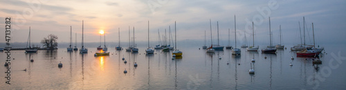 Panoramic view of Boats and Sunrise