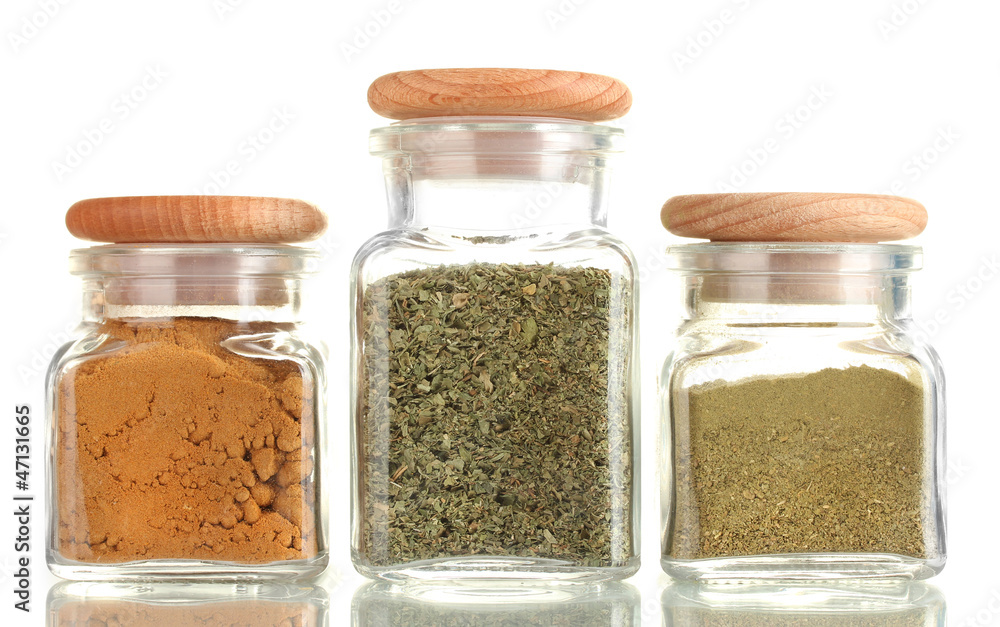 powder spices in glass jars isolated on white powder spices in glass jars isolated on white