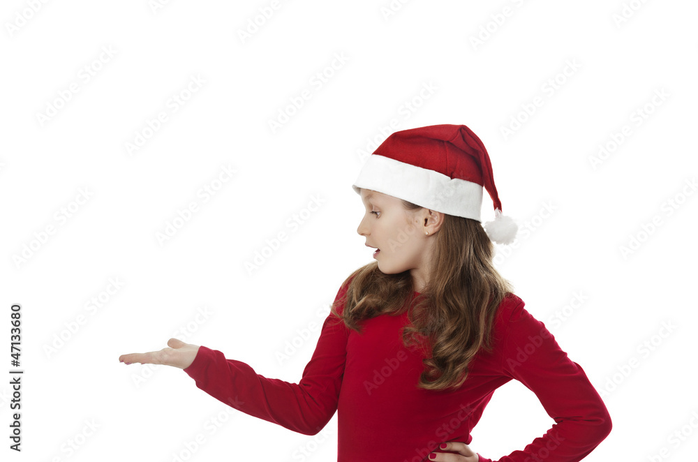 cute young girl with xmas hat with empty hand cute young girl with xmas hat with empty hand