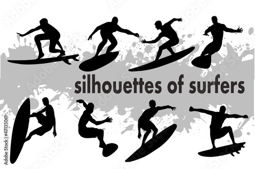 silhouettes of surfers