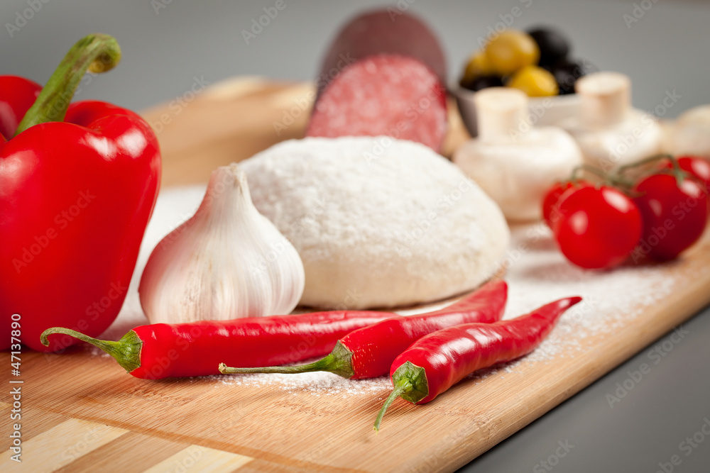 A set of food products for cooking pizza. A set of food products for cooking pizza.