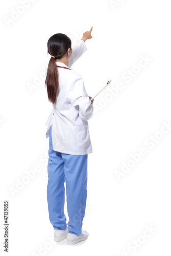 back view of doctor woman finger point