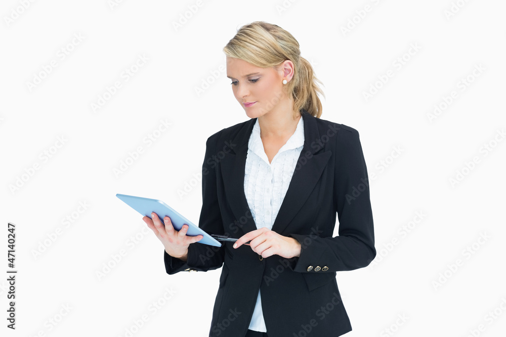 Woman planning and touching on her tablet Woman planning and touching on her tablet
