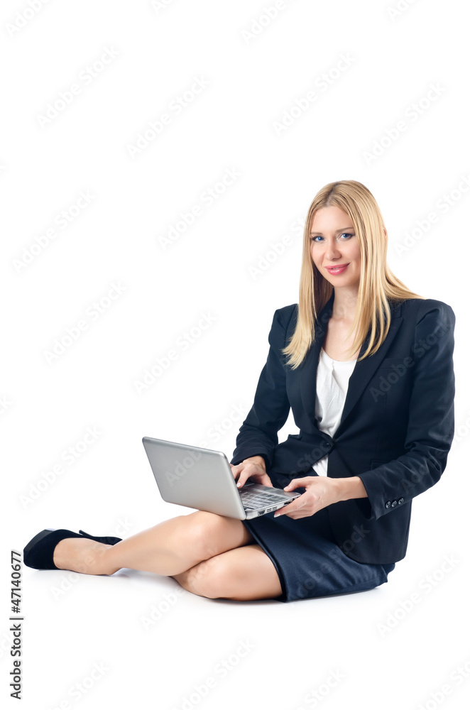 Businesswoman sitting on floor with laptop Businesswoman sitting on floor with laptop