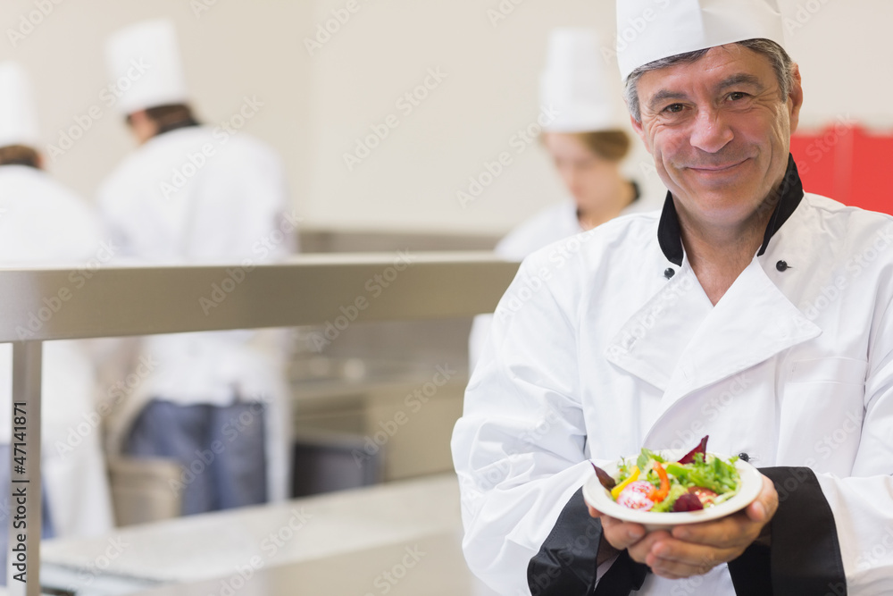 Chef presenting his salad