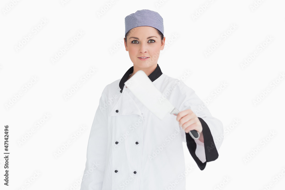 Cook holding a meat cleaver Cook holding a meat cleaver