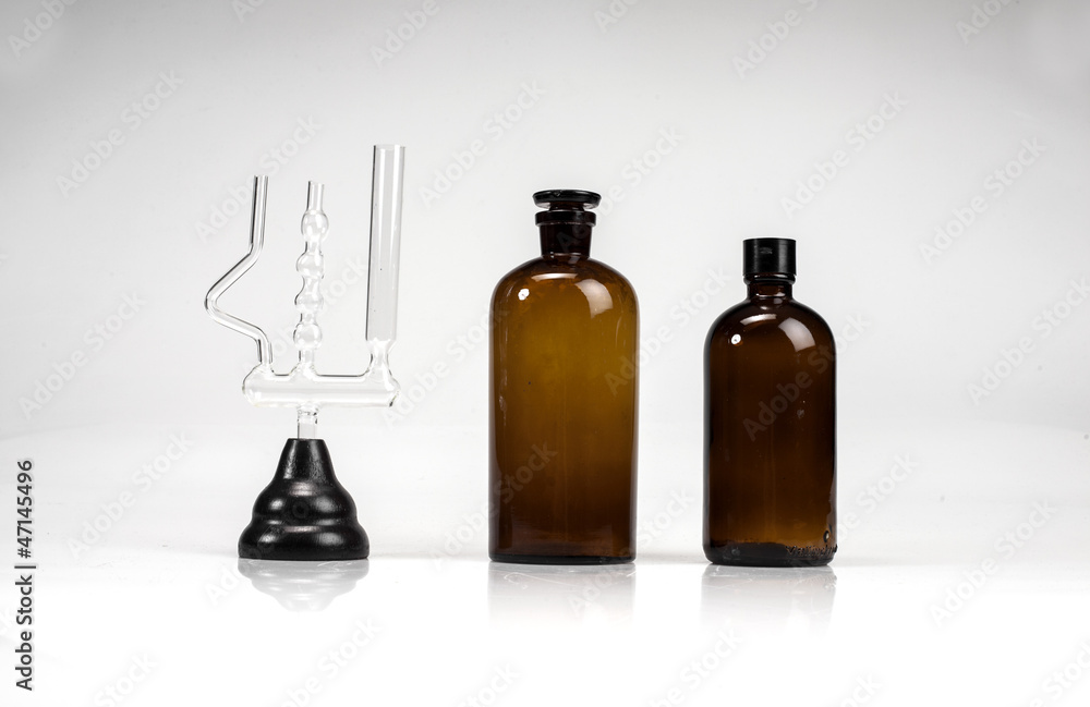 Pharmacy bottles and test-tubes Pharmacy bottles and test-tubes