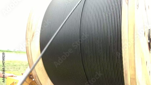 Unreeling Fiber Optic Cable into Hole