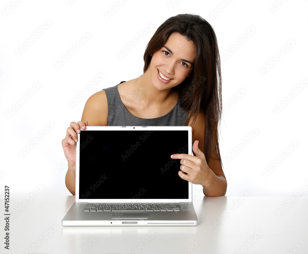 Attractive business girl showing laptop screen Attractive business girl showing laptop screen