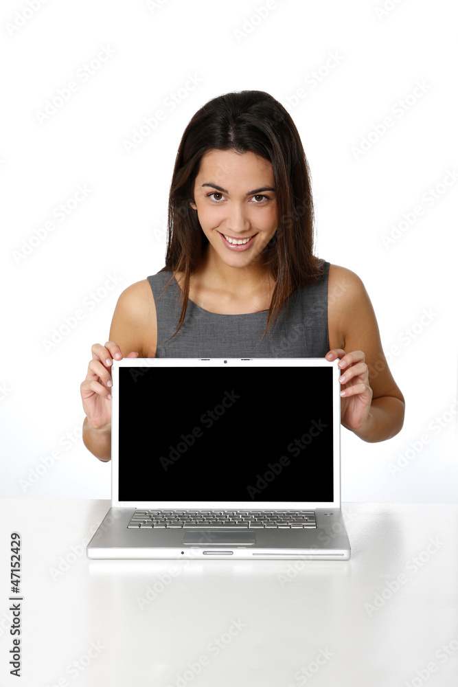 Attractive business girl showing laptop screen Attractive business girl showing laptop screen