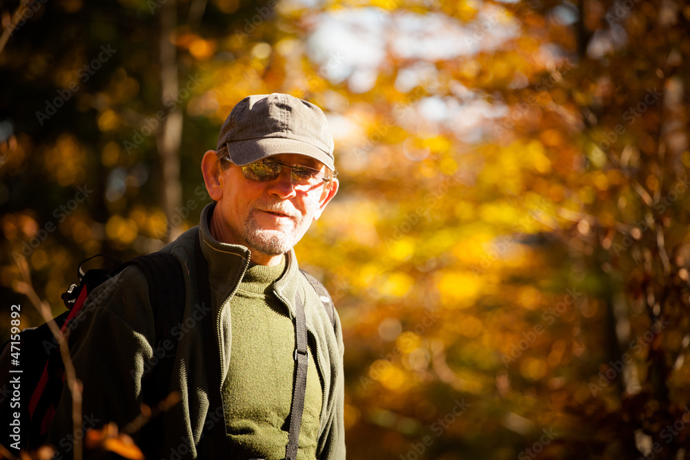 Adult mans portrait in autumn woods Adult mans portrait in autumn woods