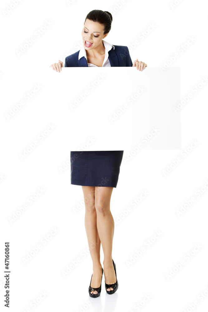 Business woman showing blank signboard Business woman showing blank signboard
