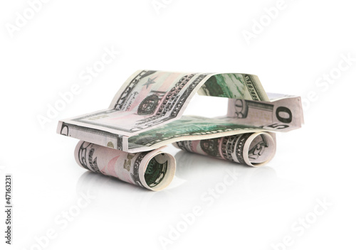 car made from dollar isolated on white background