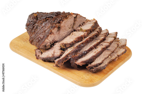 Roast beef on a wooden board