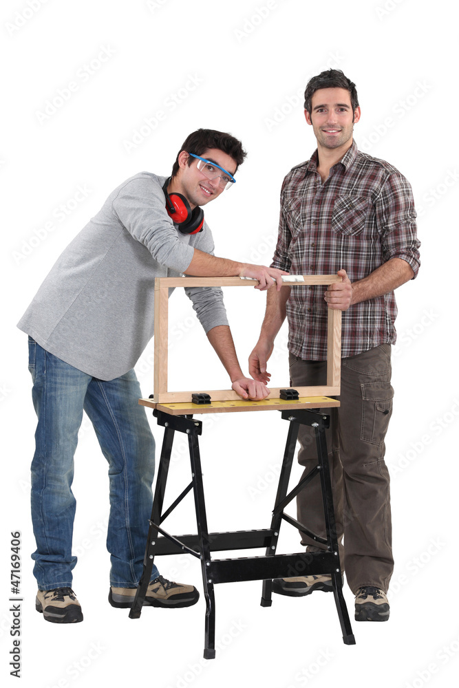 Father and son working on carpentry project