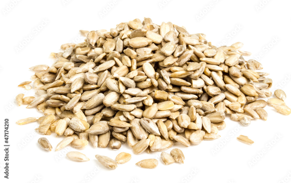 fresh sunflower seeds isolated on a white background