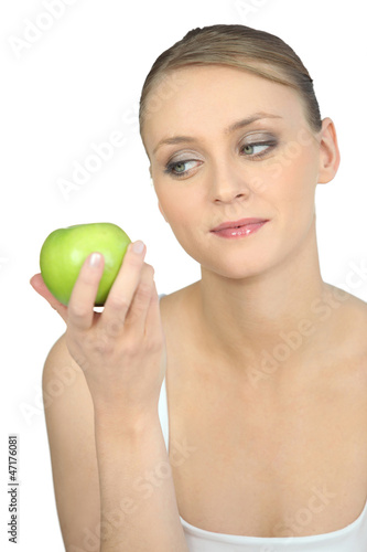 Woman with green apple