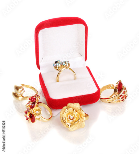Gold ring with blue, black, lilac and clear crystals in red