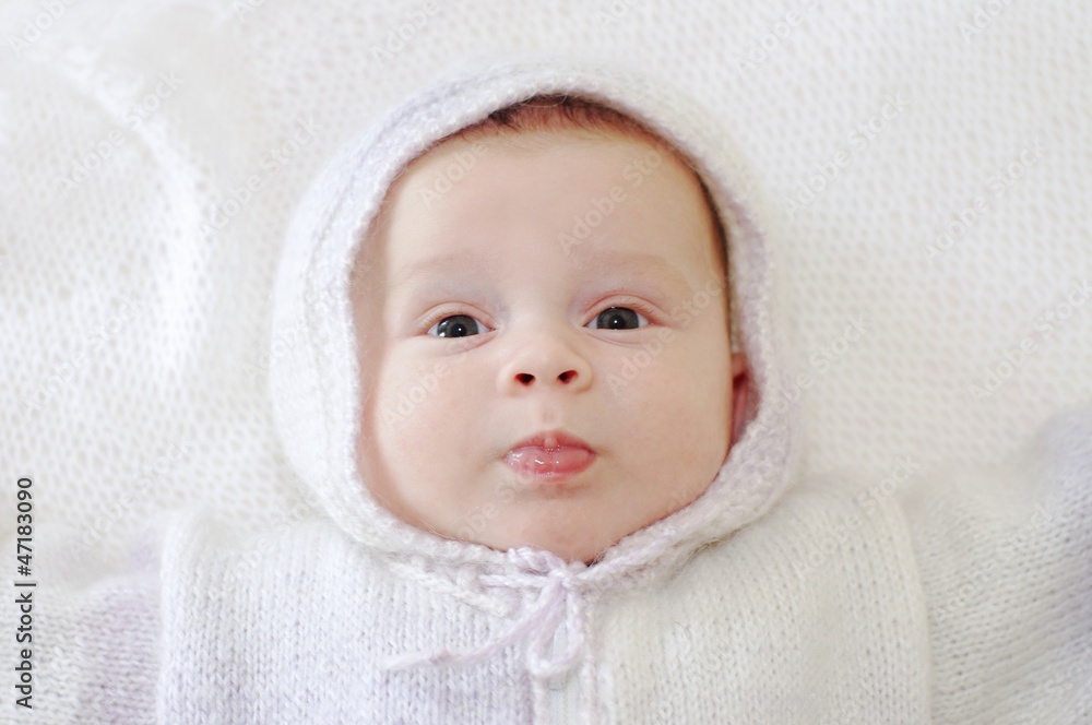 Portrait of the ridiculous baby in a knitted suit (2 months) Portrait of the ridiculous baby in a knitted suit (2 months)