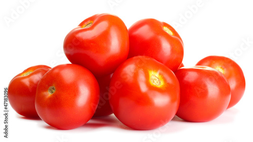 Ripe red tomatoes isolated on white