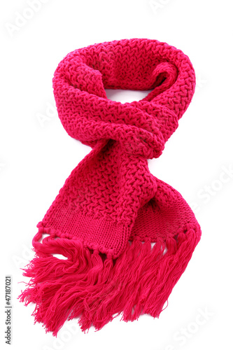 Pink knitted scarf isolated on white.