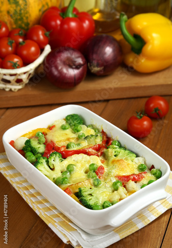 Vegetable casserole and fresh vegetables