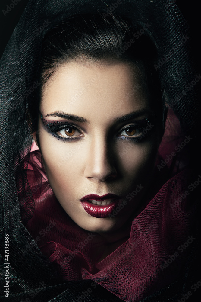portrait of woman in black hood portrait of woman in black hood