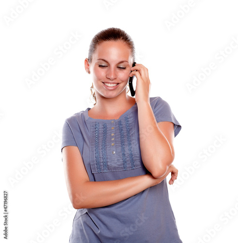 Lovely young woman speaking on cellphone