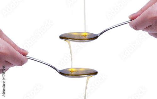close up of olive oil on white background with clipping path
