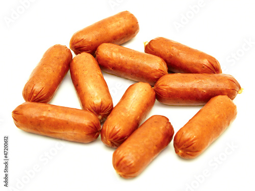 Little sausages isolated on white background