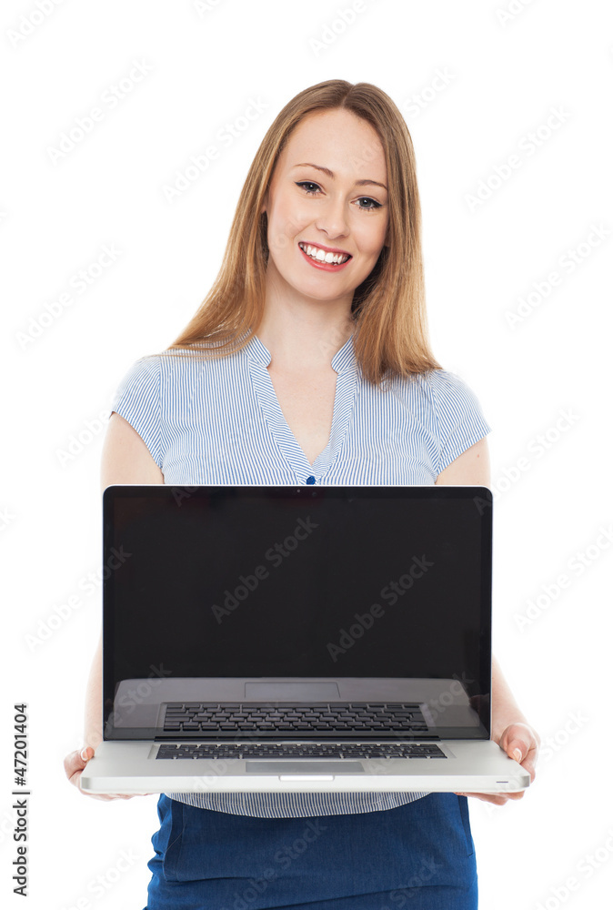 Young businesswoman holding laptop Young businesswoman holding laptop