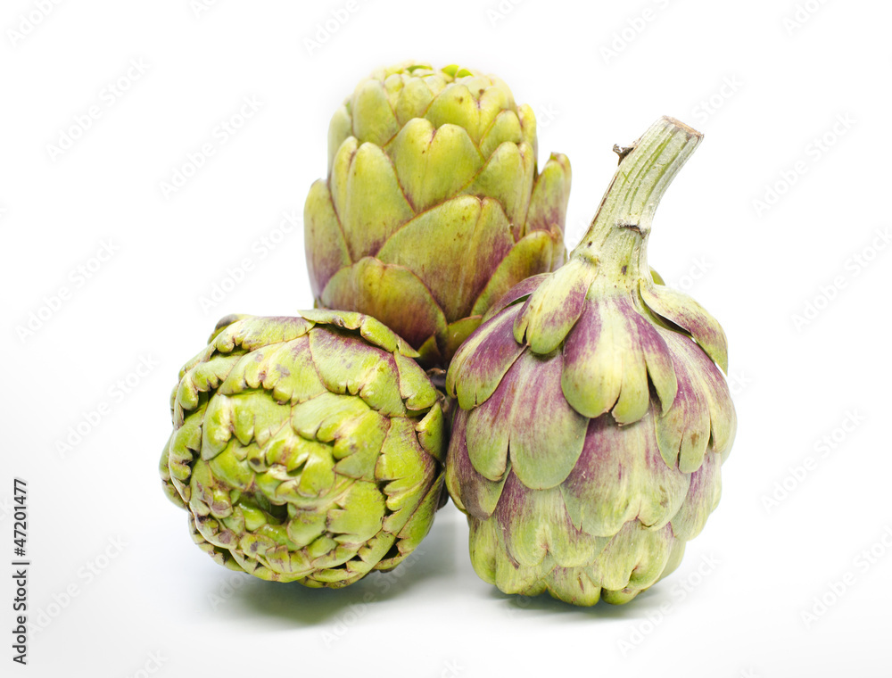 Obraz premium Three whole artichoke isolated on white background.