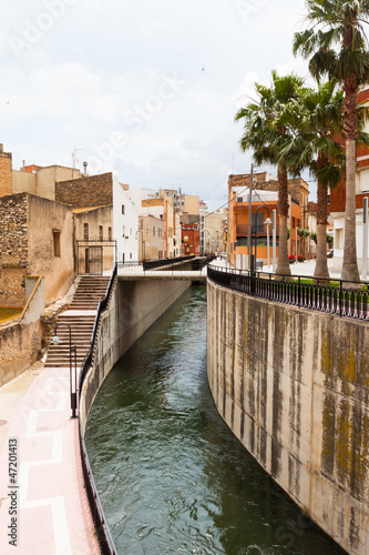 Water canal in Amposta, Spain photo