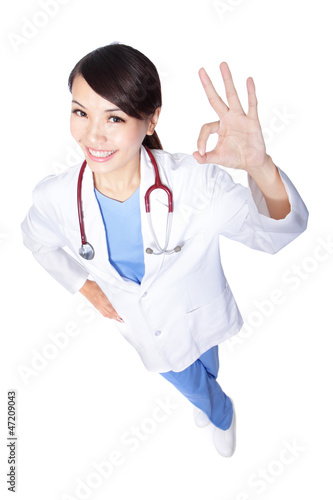 Woman doctor show ok hand gesture