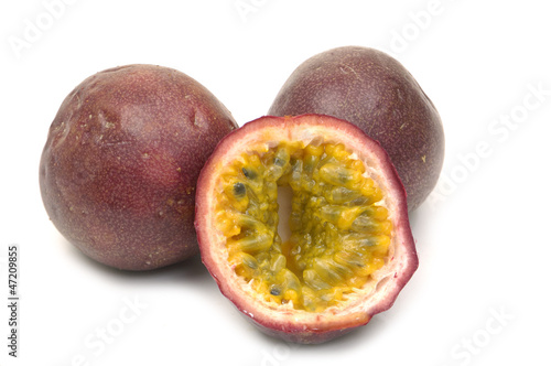 passion fruit , cut open on white background