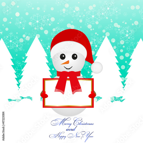 Snowman with a sign in a snowy forest