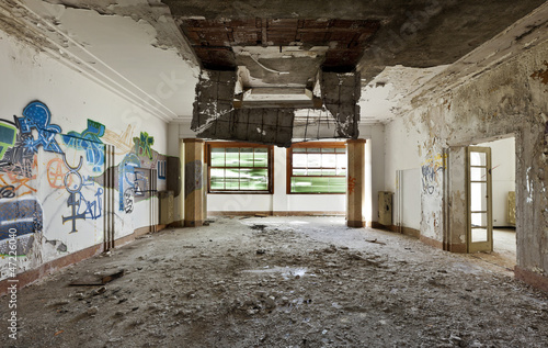 abandoned building  large room  debris on the floor