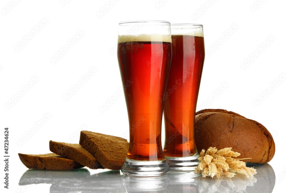 two glasses of kvass and rye breads with ears, isolated on two glasses of kvass and rye breads with ears, isolated on