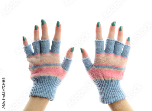 woman knitted gloves on hands, isolated on white photo