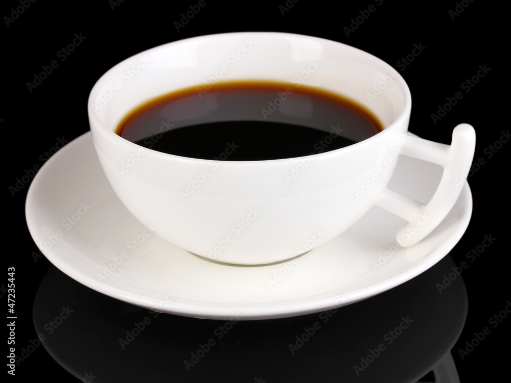 Obraz premium A cup of strong coffee isolated on black