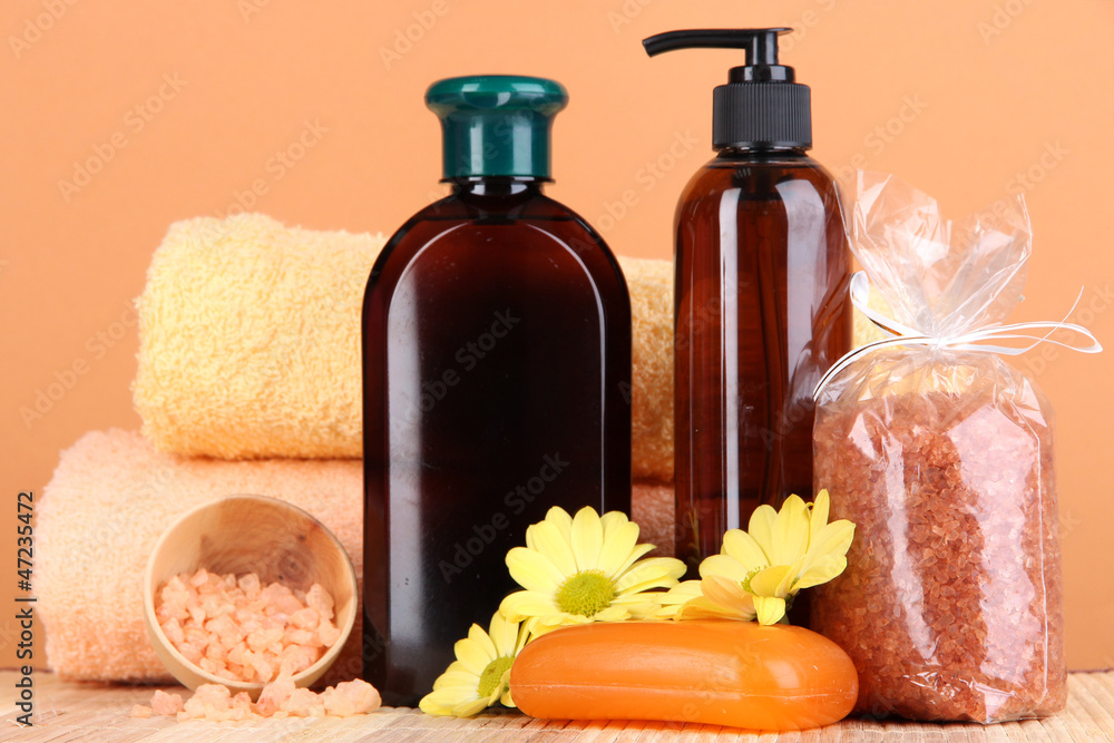 Set for care of a body on peach background Set for care of a body on peach background