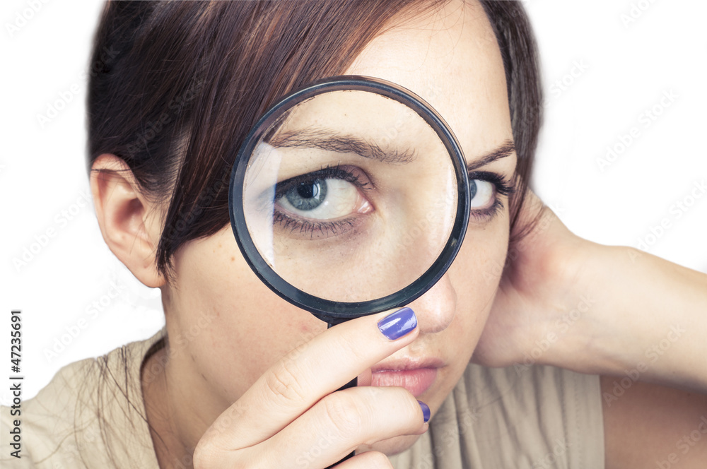 girl with magnifying glass over her face girl with magnifying glass over her face